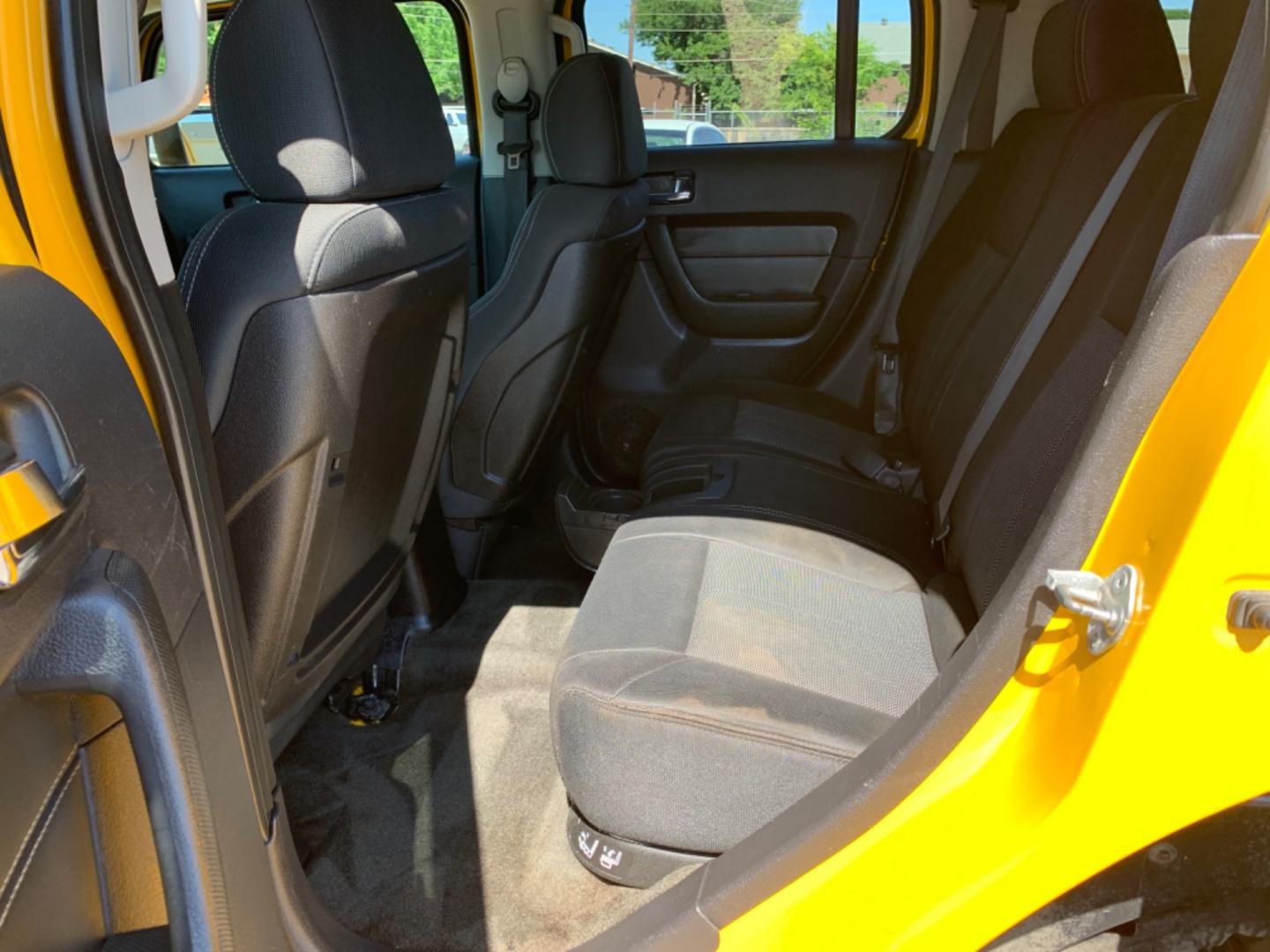 2007 Yellow /gray Hummer H3 Adventure (5GTDN13E378) with an 3.7L L5 DOHC 20V engine, AUTOMATIC transmission, located at 1830 North Belt Line Road, Irving, TX, 75061, (469) 524-0199, 32.834373, -96.993584 - Photo#8